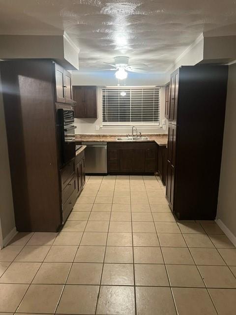 3717 Cranston Court East Irving, TX 75062 - Photo 4 of 12 a kitchen with a black refrigerator and a stove