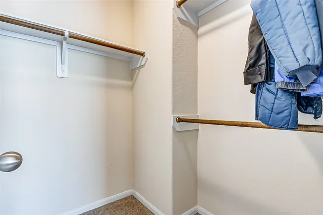 a view of a room with rack on the wall