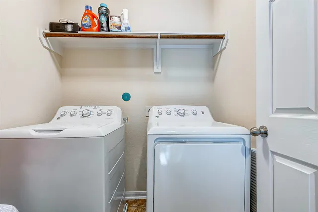 a utility room with dryer and washer