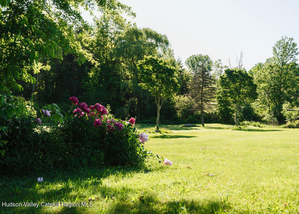 652 Albany Post Road New Paltz, NY 12561 - Photo 23 of 36 a view of a swimming pool with an outdoor space and seating area