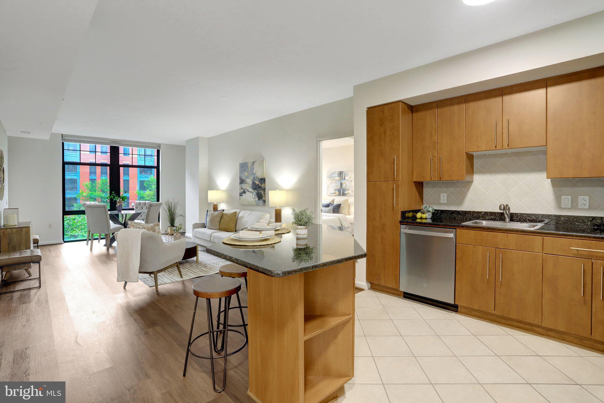 1021 North Garfield Street, Unit 315 Arlington, VA 22201 - Photo 4 of 43 Open kitchen w/island countertop/bar area