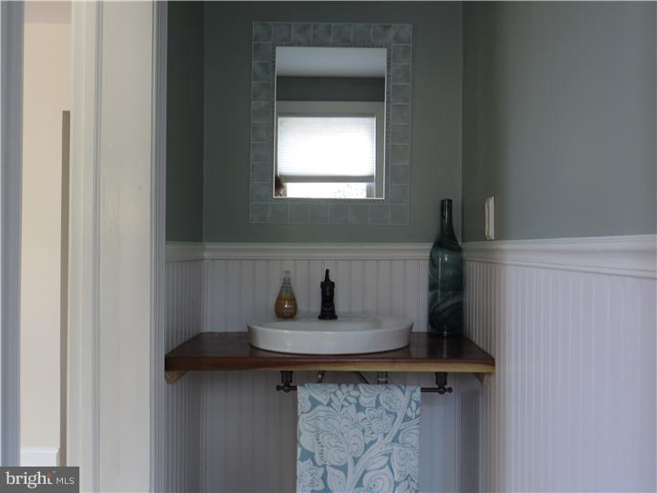 108 Grubb Road Malvern, PA 19355 - Photo 8 of 23 a bathroom with a sink and a mirror