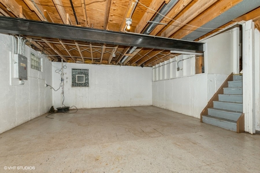 162 White Oaks Road Matteson, IL 60443 - Photo 14 of 14 a view of an empty room with stairs