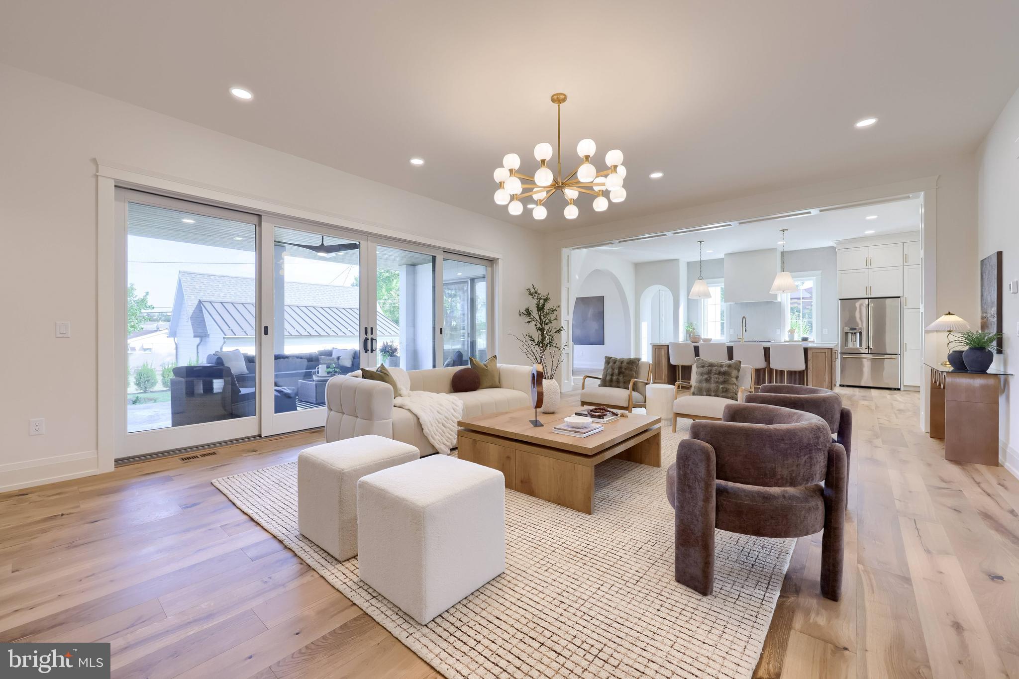 519 Cedar Avenue Hershey, PA 17033 - Photo 22 of 82 a living room with furniture potted plant and a chandelier