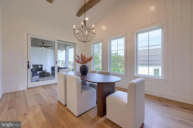 a room with a wooden floor and shelf