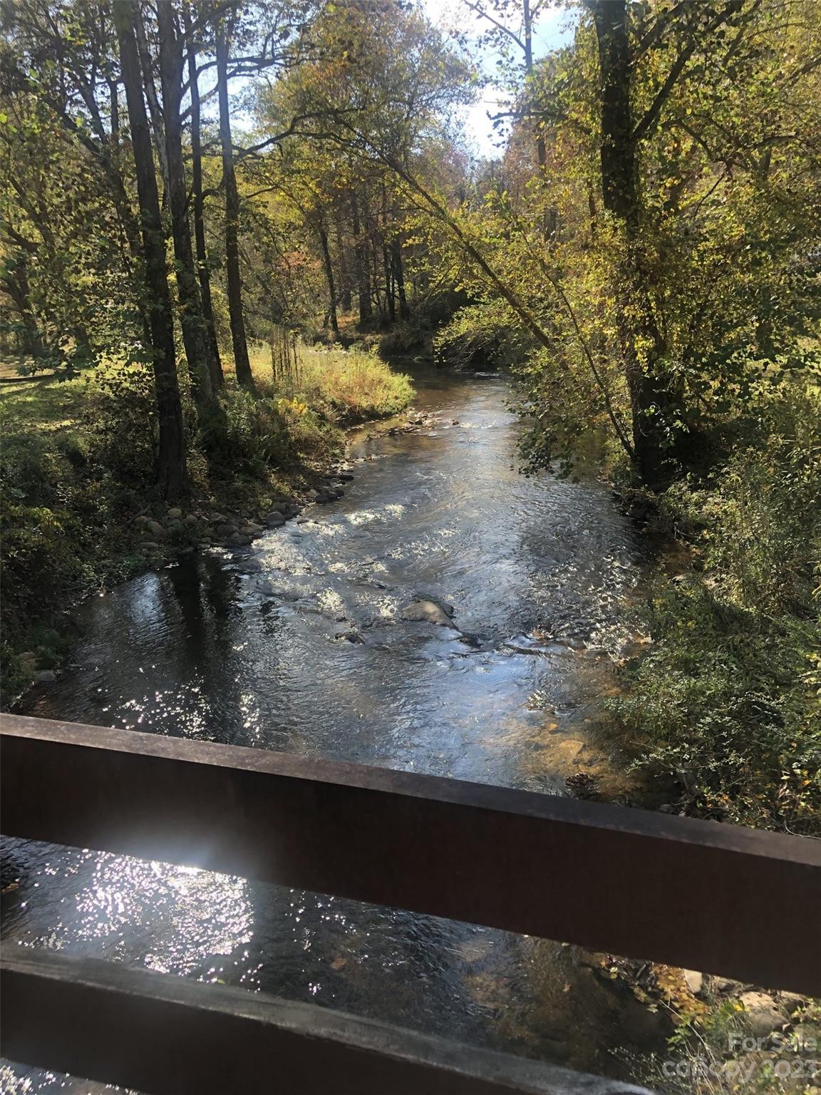 29 Crossings Circle, Unit 11 Fairview, NC 28730 - Photo 4 of 6 a view of a lake from a balcony
