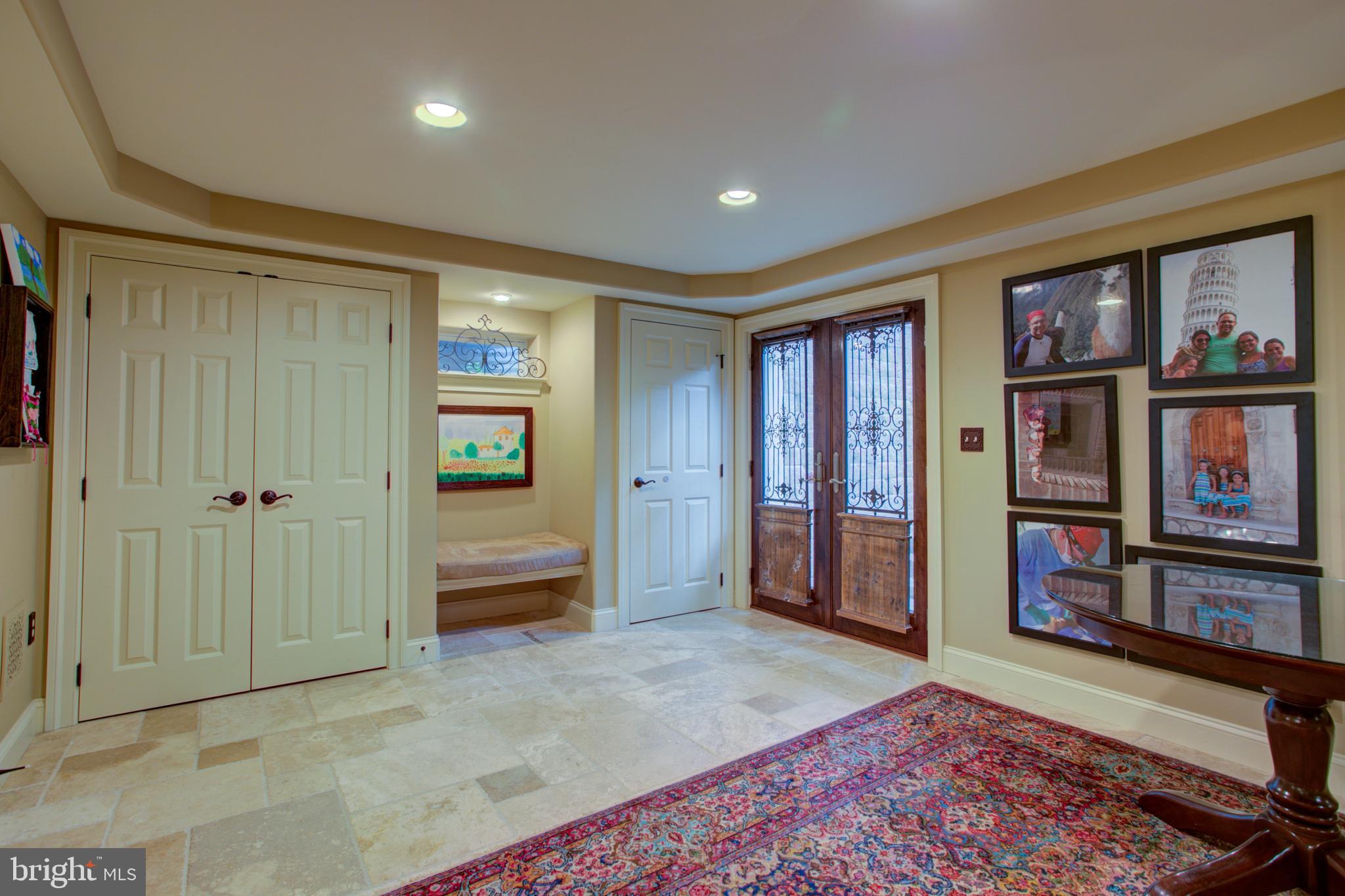1626 Meadowlark Road Wyomissing, PA 19610 - Photo 41 of 123 Basement exterior entry doors, storage, bench
