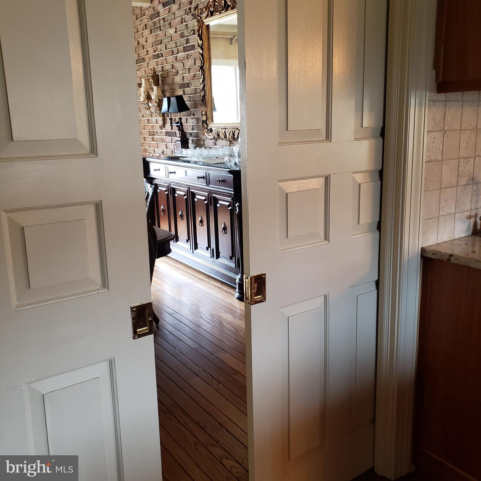 1626 Meadowlark Road Wyomissing, PA 19610 - Photo 68 of 123 Double pocket doors separate Kitchen/Dining Room