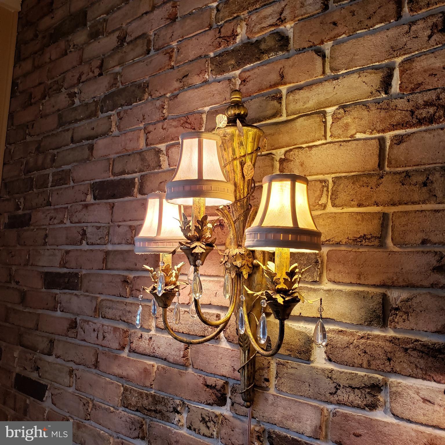 1626 Meadowlark Road Wyomissing, PA 19610 - Photo 72 of 123 Sconce in dining room on real brick wall