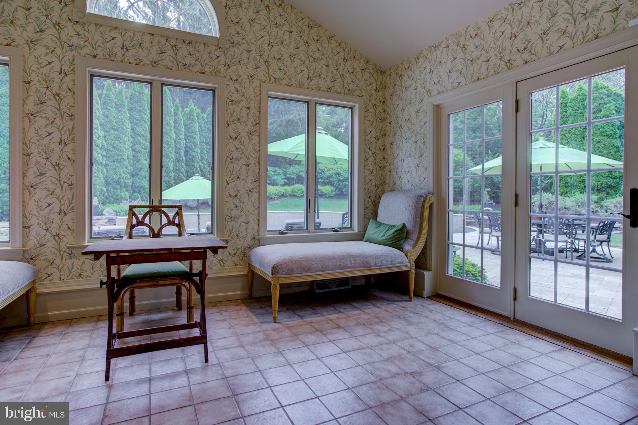 1626 Meadowlark Road Wyomissing, PA 19610 - Photo 80 of 123 Sunroom overlooks pool & patios
