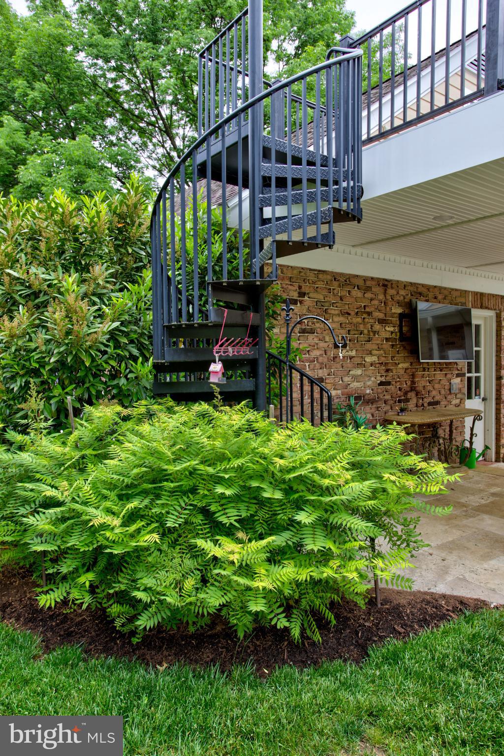 1626 Meadowlark Road Wyomissing, PA 19610 - Photo 8 of 123 Spiral staircase to second level porch