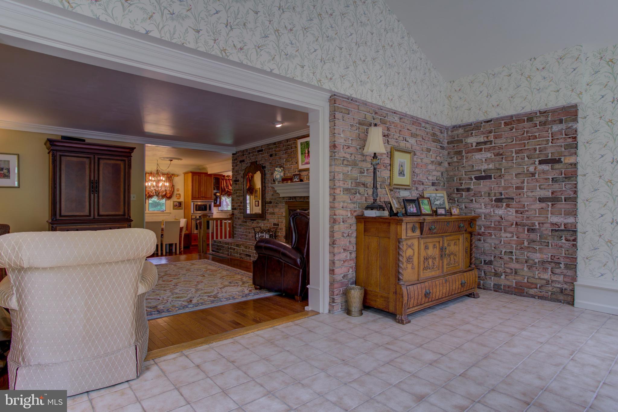 1626 Meadowlark Road Wyomissing, PA 19610 - Photo 83 of 123 Tiled sunroom opens to family room
