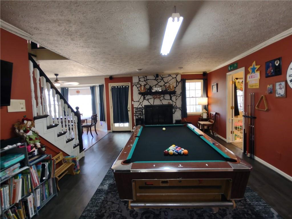23 The Trail Southeast Lindale, GA 30147 - Photo 15 of 37 a living room with furniture pool table and flat screen tv