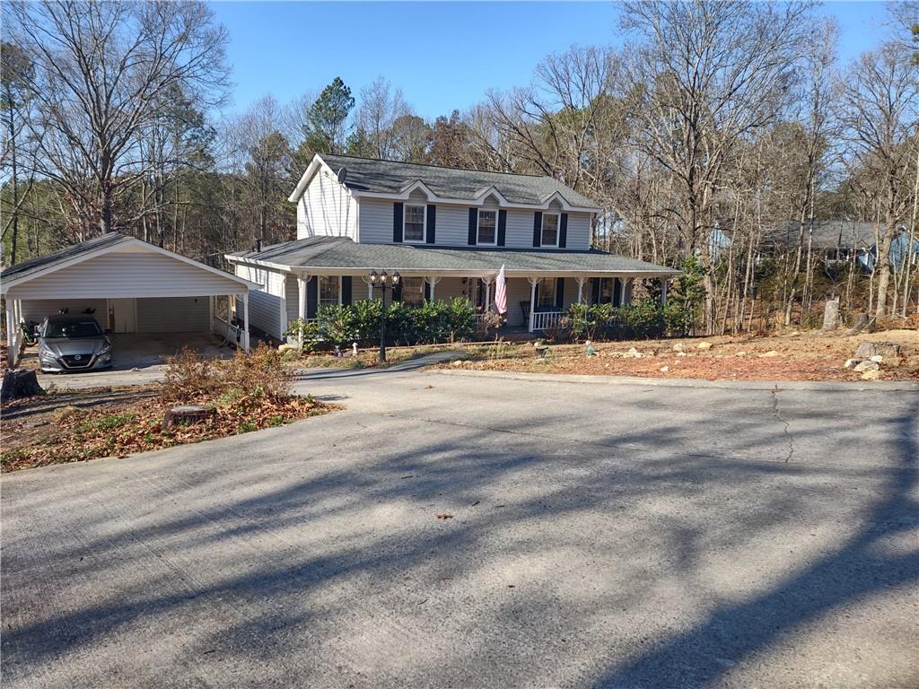 23 The Trail Southeast Lindale, GA 30147 - Photo 34 of 37 a front view of a house with a yard