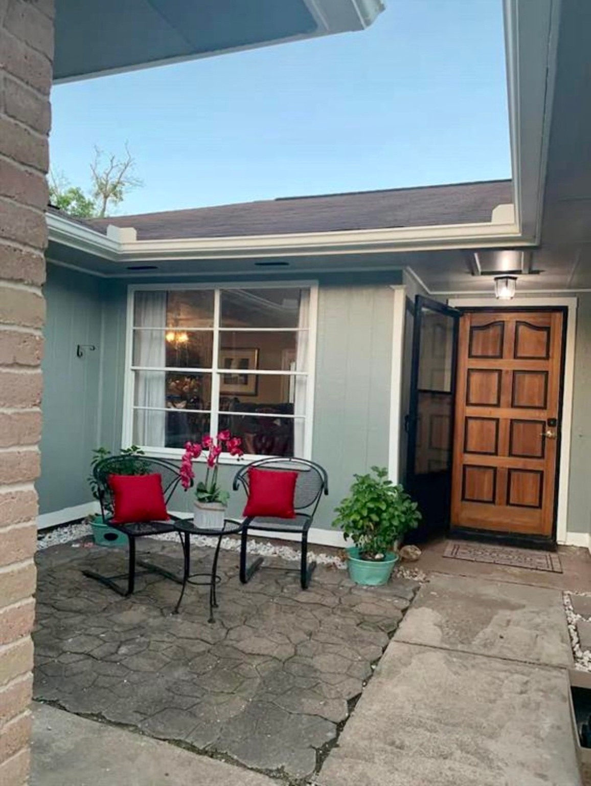 a view of a chairs in front of house
