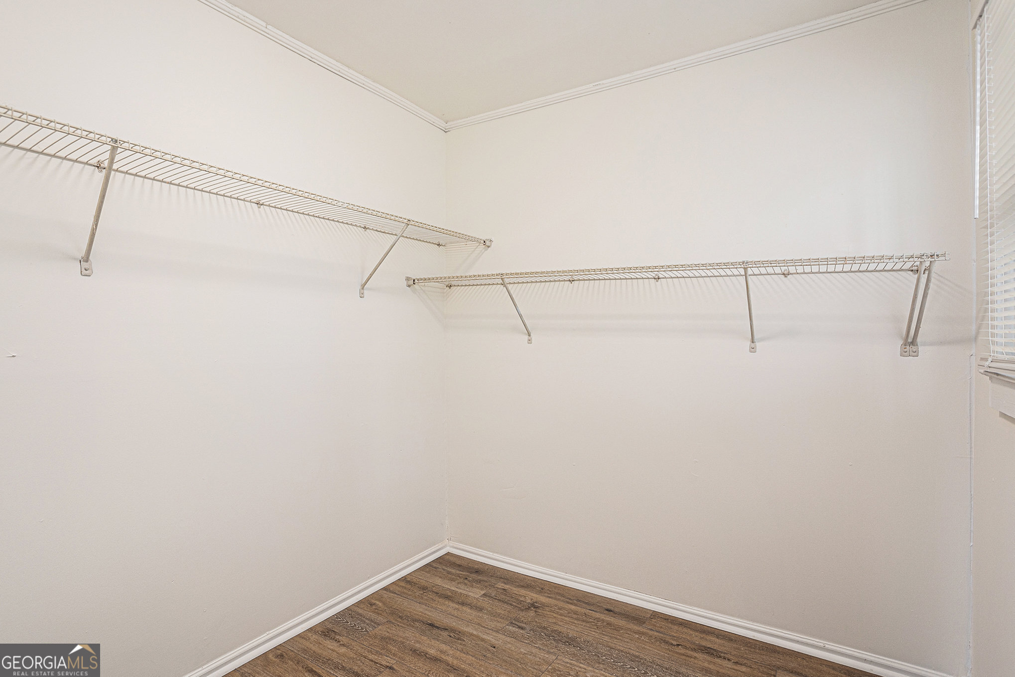 1113 Lake View Drive Jonesboro, GA 30236 - Photo 18 of 25 a view of a room with racks on the wall