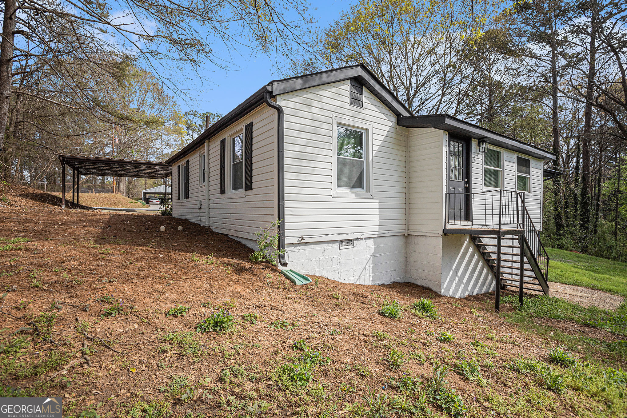 1113 Lake View Drive Jonesboro, GA 30236 - Photo 21 of 25 a front view of a house with a yard