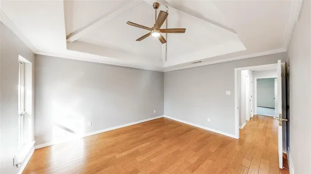 a view of room with a ceiling fan