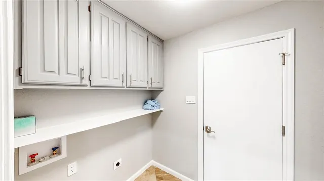 a view of cabinets with wooden floor and cabinets