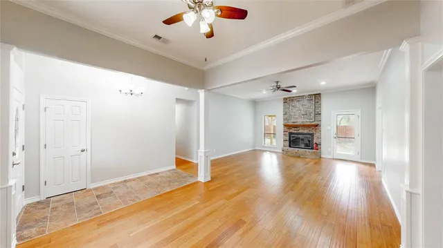 a view of a livingroom with wooden floor