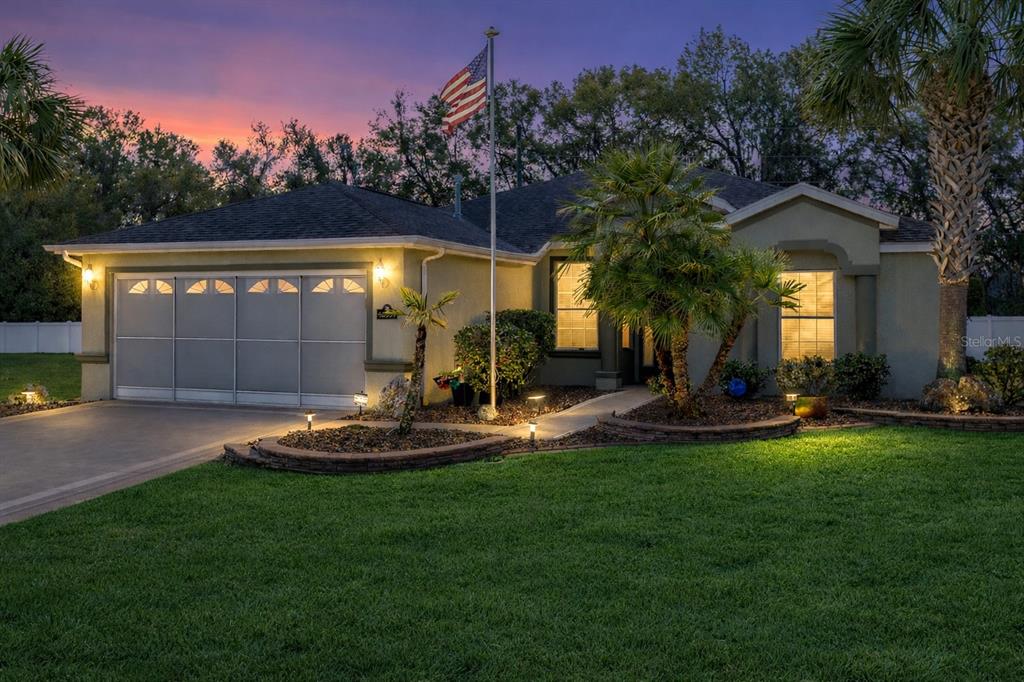 16339 Southwest 14th Avenue Road Ocala, FL 34473 - Photo 2 of 22 a view of a house with backyard and sitting area