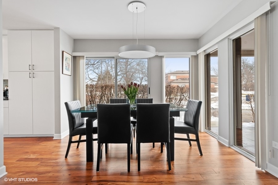 378 Milford Road Deerfield, IL 60015 - Photo 3 of 22 a view of a dining room with furniture window and wooden floor