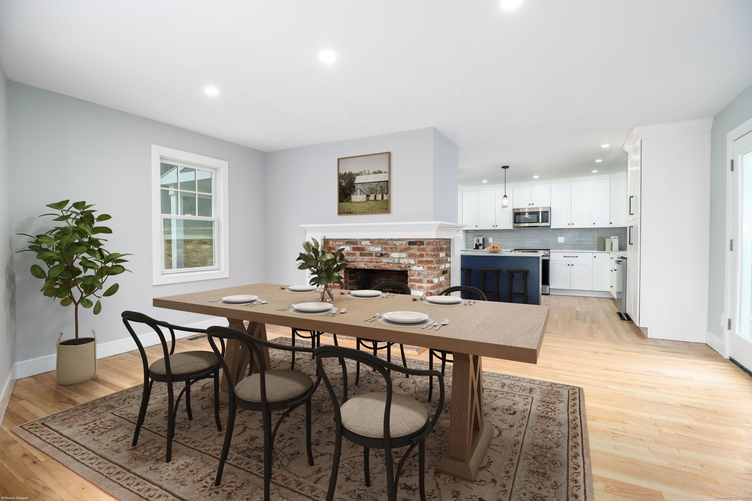 5 Antler Pine Road Newtown, CT 06482 - Photo 13 of 38 a dinning room with furniture a window and a fireplace