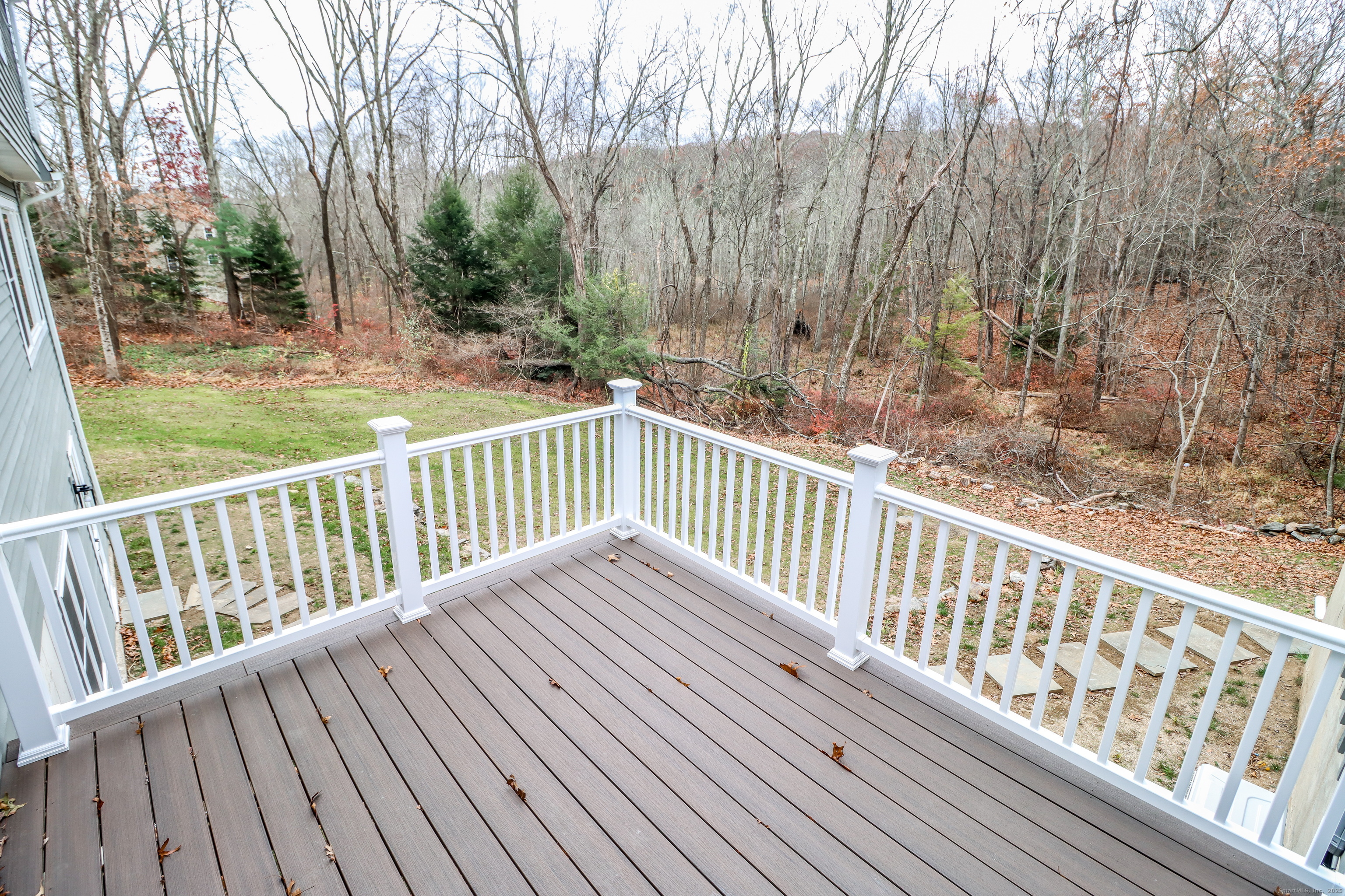 5 Antler Pine Road Newtown, CT 06482 - Photo 15 of 38 a view of balcony with wooden floor