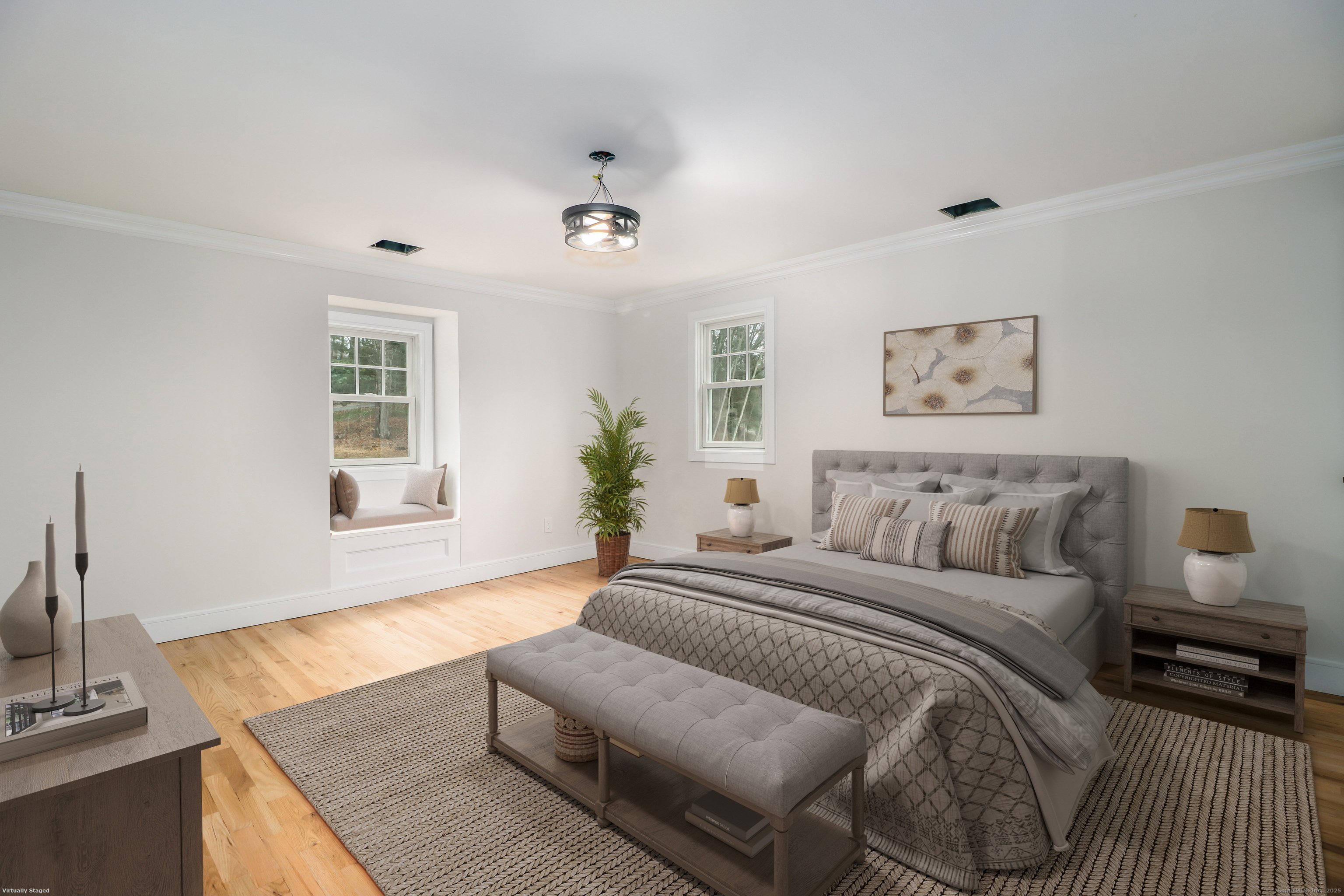 5 Antler Pine Road Newtown, CT 06482 - Photo 19 of 38 a spacious bedroom with a bed a couch and windows