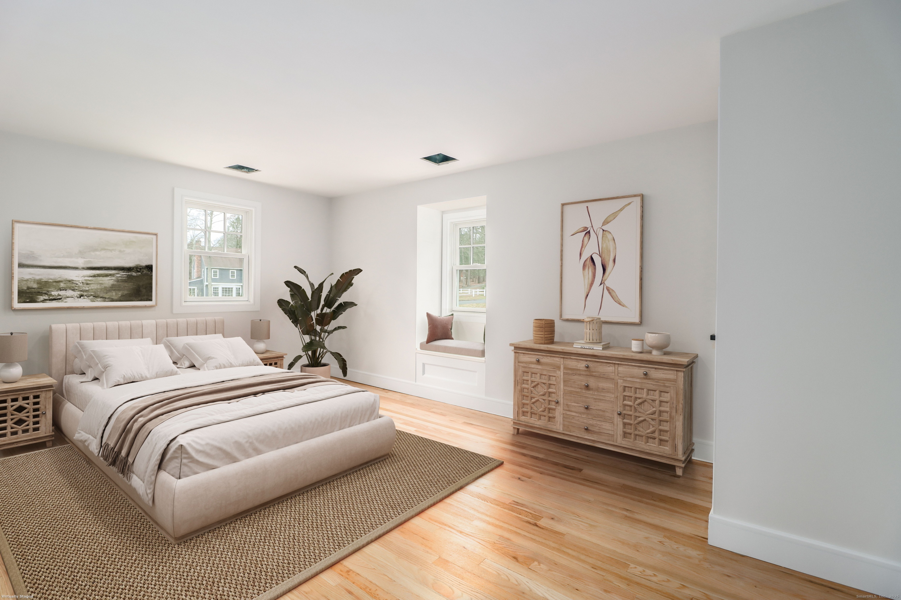 5 Antler Pine Road Newtown, CT 06482 - Photo 23 of 38 a bedroom with a large bed and a chandelier