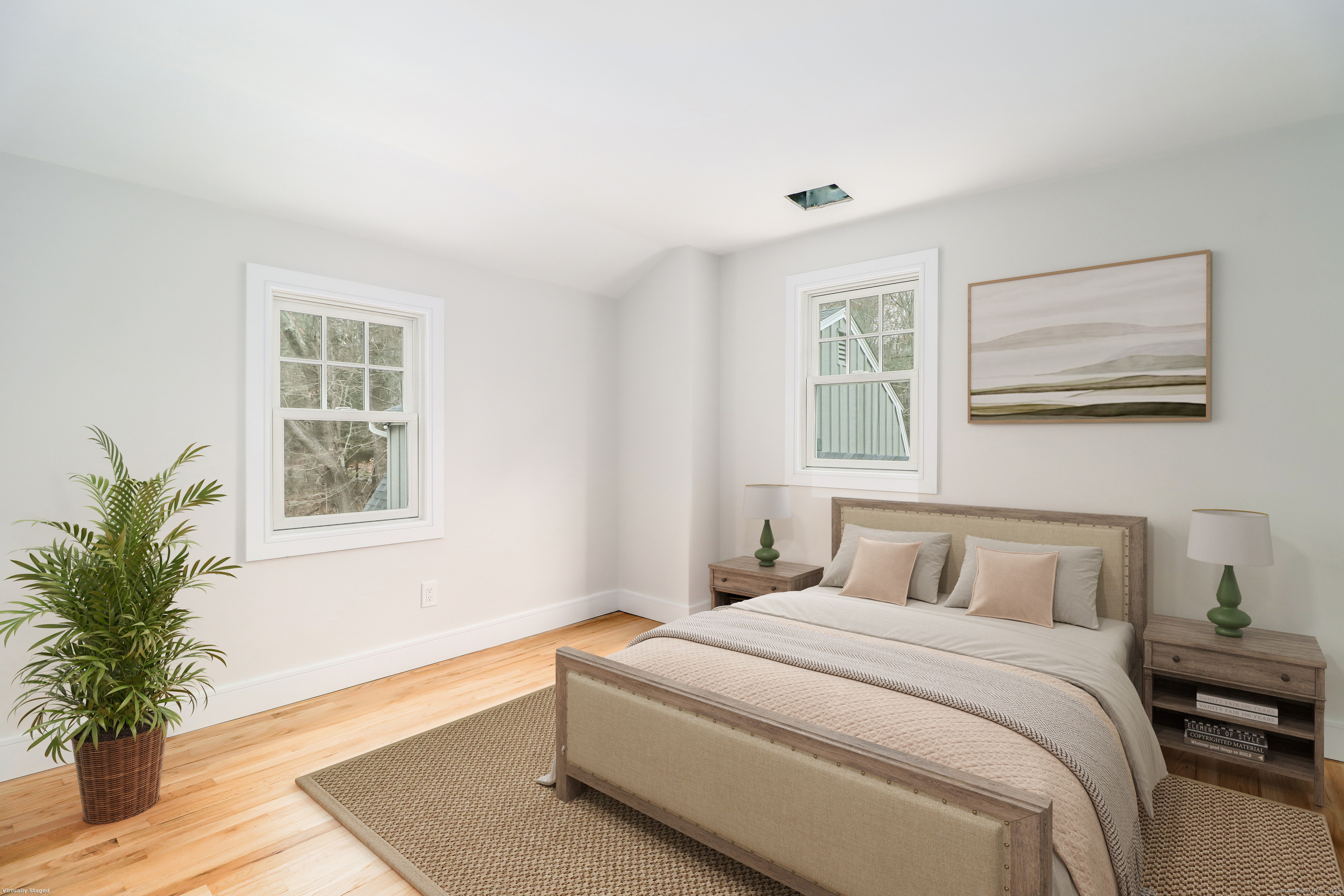 5 Antler Pine Road Newtown, CT 06482 - Photo 26 of 38 a bedroom with a large bed and a potted plant