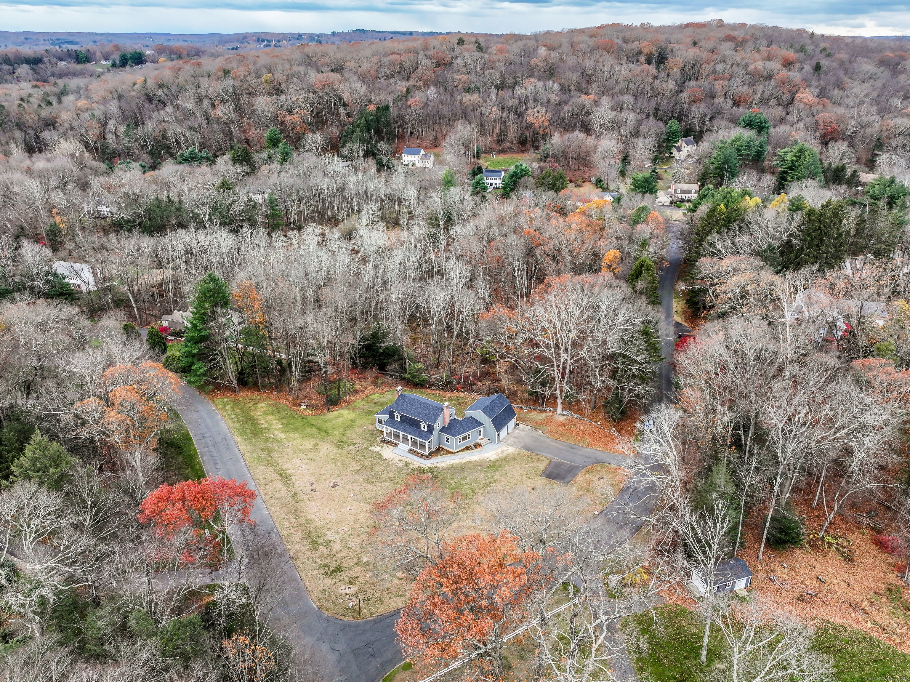 5 Antler Pine Road Newtown, CT 06482 - Photo 31 of 38 an aerial view of a house with a yard