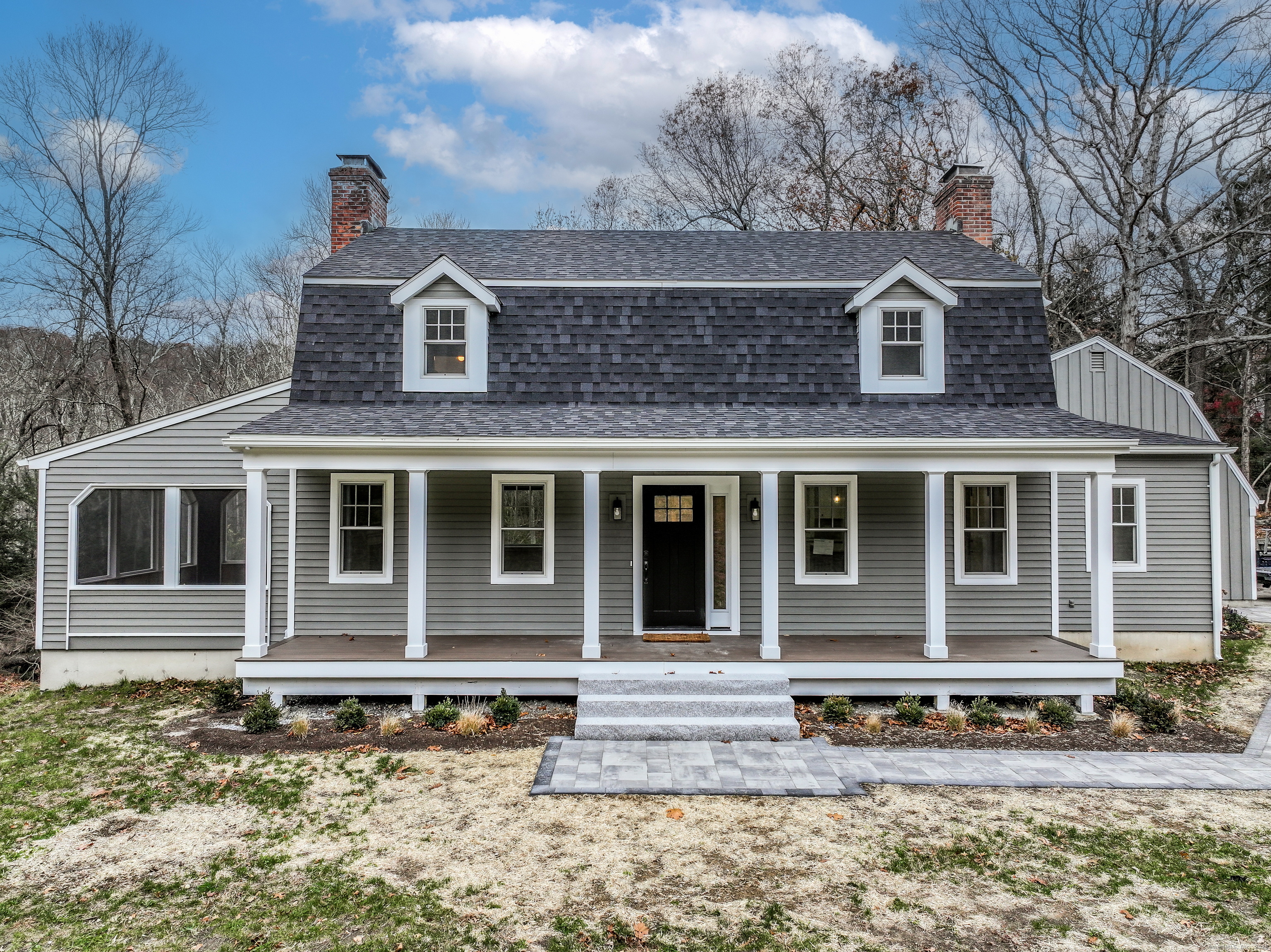 5 Antler Pine Road Newtown, CT 06482 - Photo 34 of 38 a front view of a house with a yard
