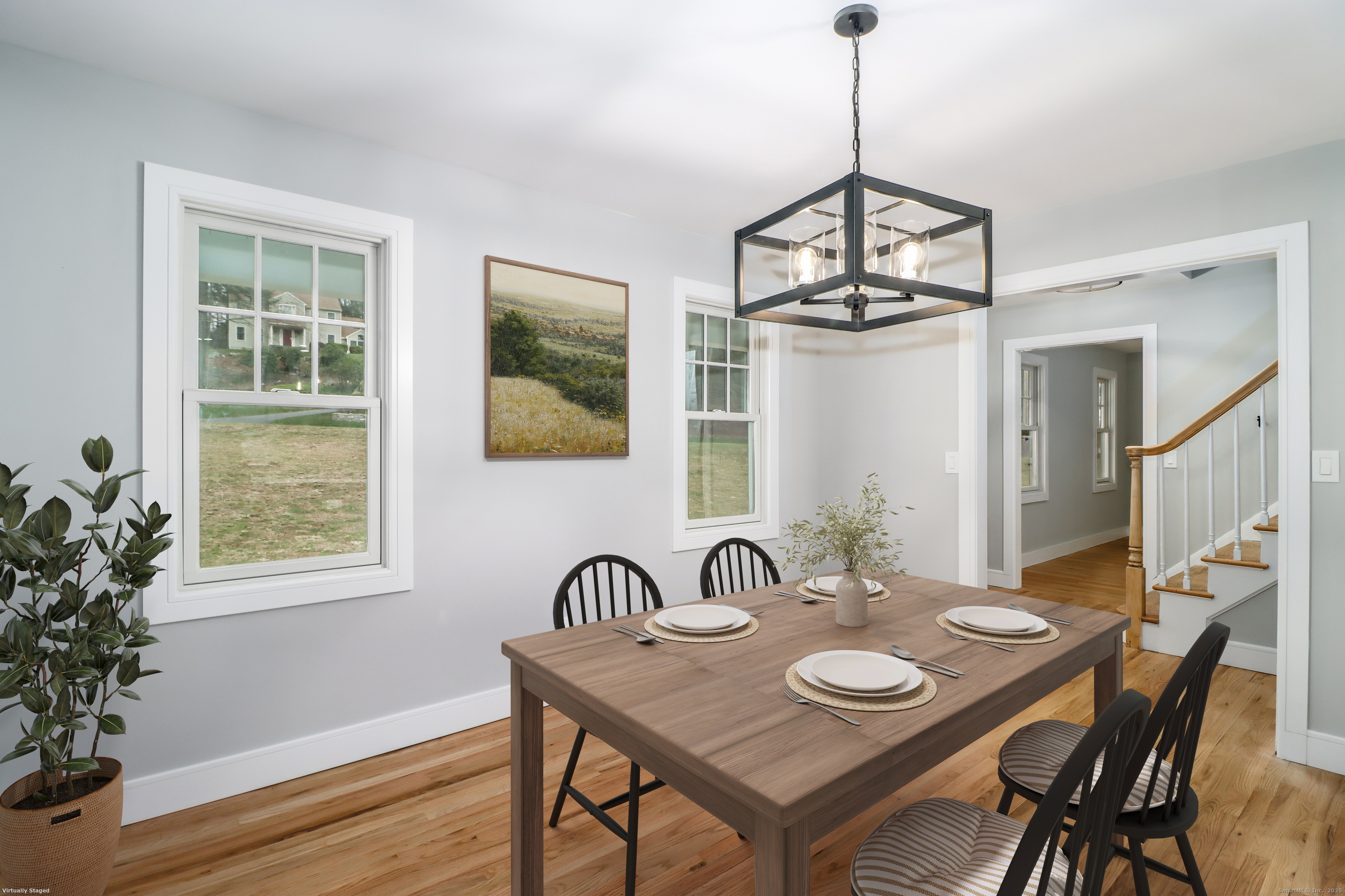 5 Antler Pine Road Newtown, CT 06482 - Photo 10 of 38 a view of a dining room with furniture window and wooden floor
