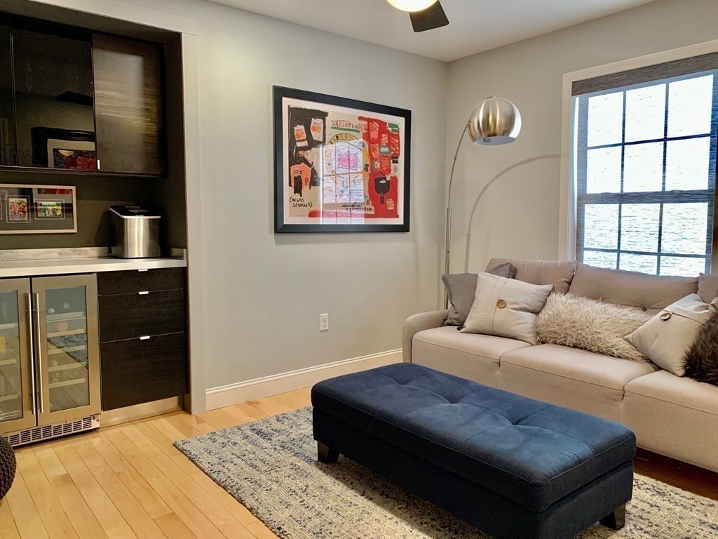 696 Florence Road Northampton, MA 01062 - Photo 15 of 35 a living room with furniture and a dresser