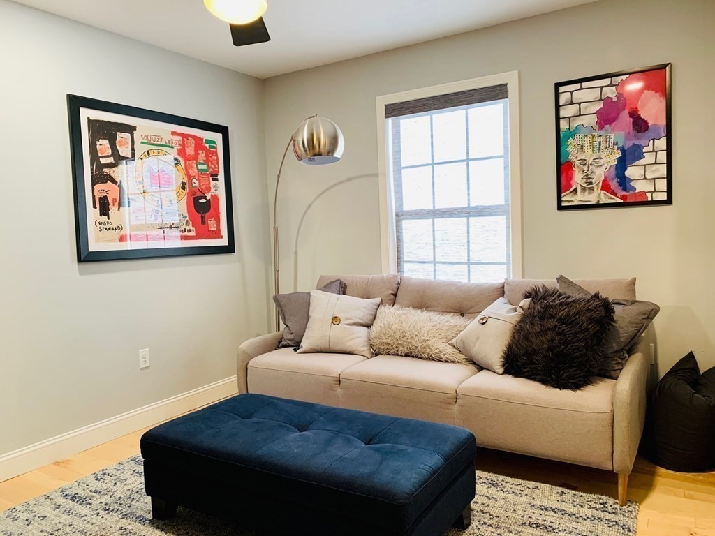 696 Florence Road Northampton, MA 01062 - Photo 16 of 35 a living room with furniture and a window