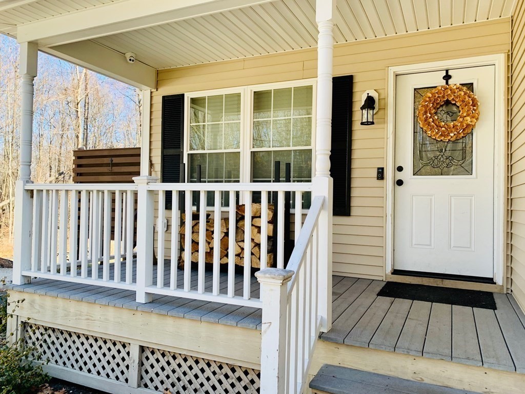 696 Florence Road Northampton, MA 01062 - Photo 2 of 35 a view of a wooden balcony