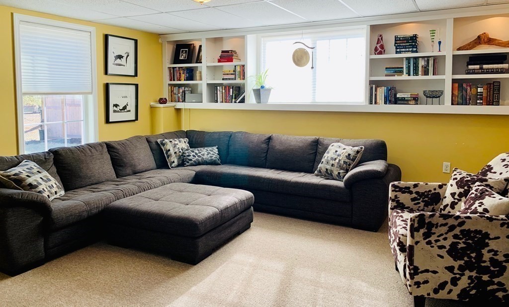 696 Florence Road Northampton, MA 01062 - Photo 23 of 35 a living room with furniture window and book shelf