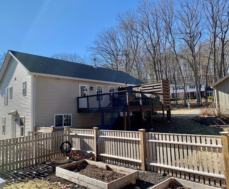 696 Florence Road Northampton, MA 01062 - Photo 29 of 35 a view of house with a patio