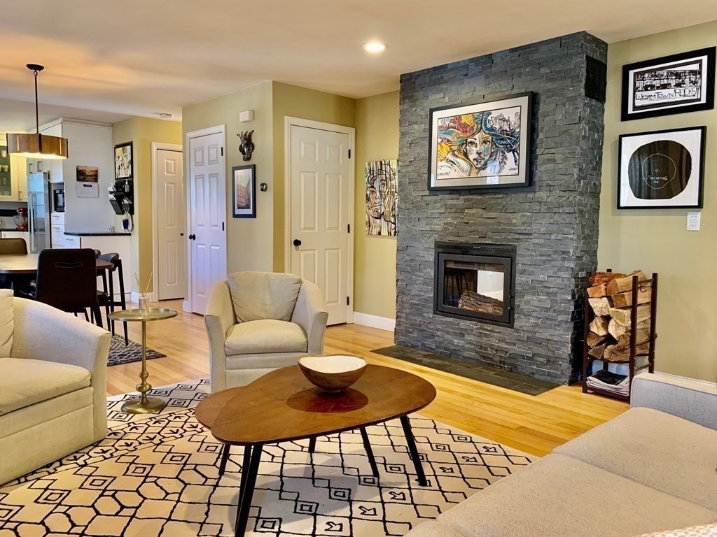 696 Florence Road Northampton, MA 01062 - Photo 4 of 35 a living room with furniture and a fireplace