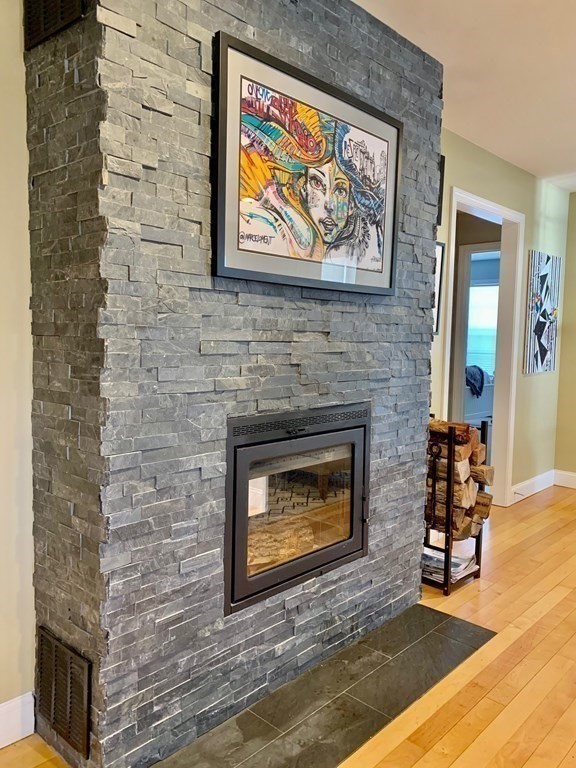 696 Florence Road Northampton, MA 01062 - Photo 5 of 35 a living room with a fireplace