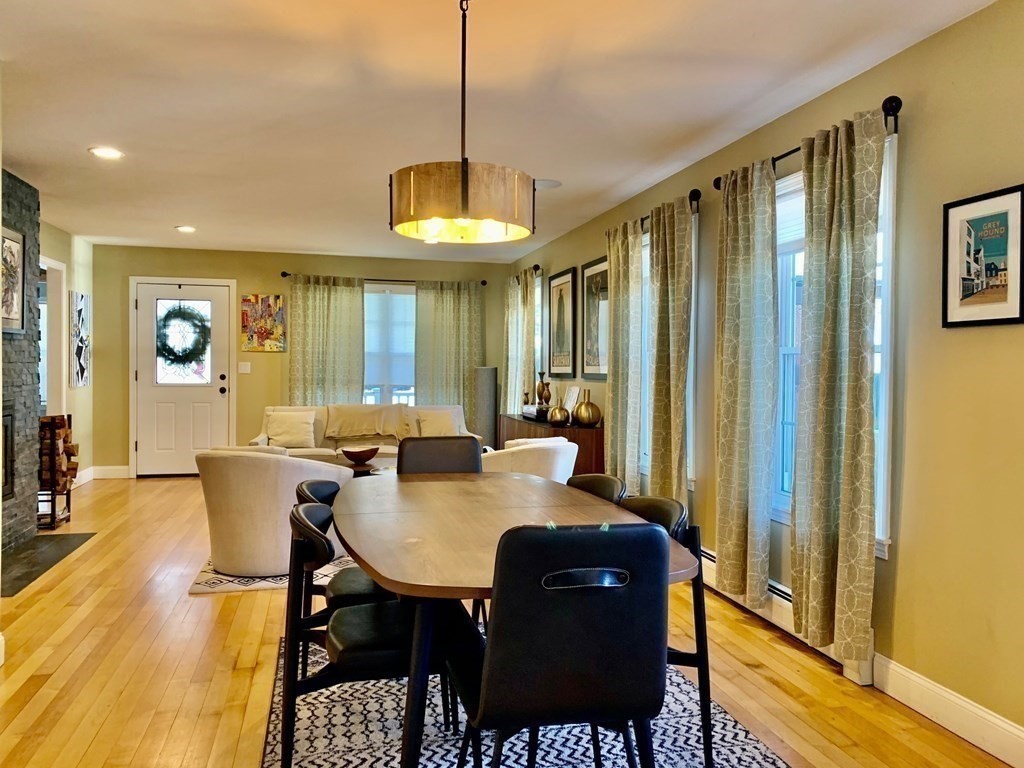 696 Florence Road Northampton, MA 01062 - Photo 7 of 35 a view of a dining room with furniture window and wooden floor