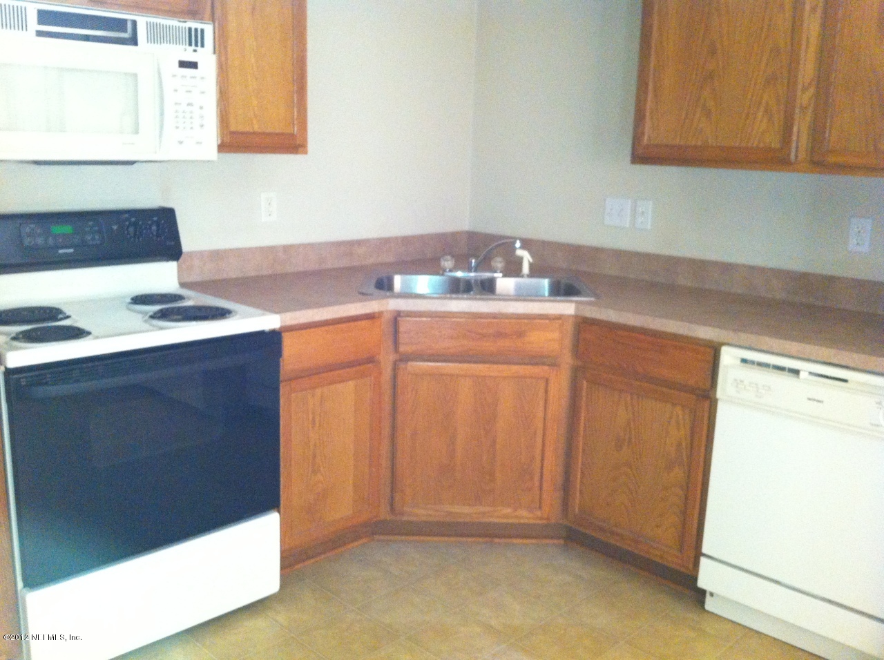 5260 Collins Road, Unit 903 Jacksonville, FL 32244 - Photo 1 of 2 a room with storage and utility