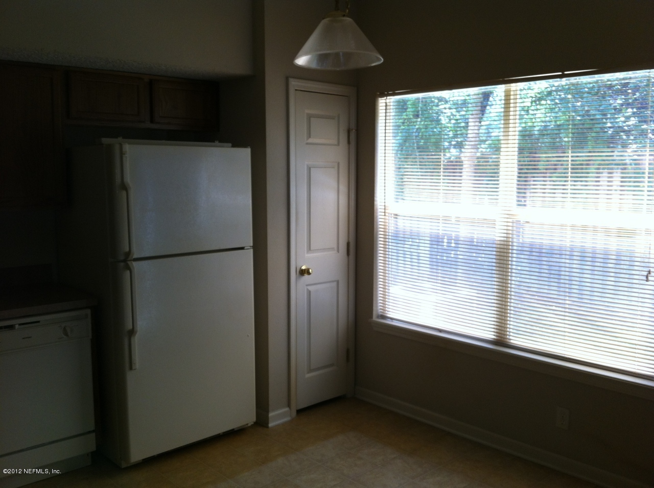 5260 Collins Road, Unit 903 Jacksonville, FL 32244 - Photo 2 of 2 a view of empty room with windows