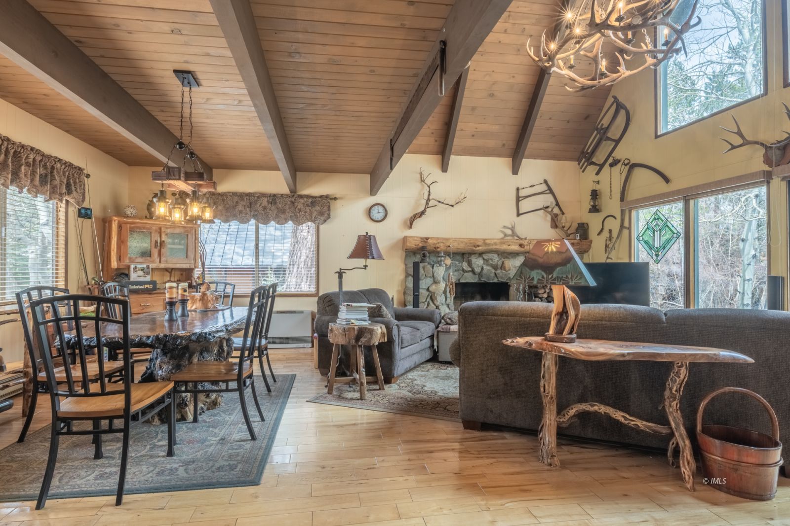 234 Brook Lane Bishop, CA 93514 - Photo 12 of 33 a living room with furniture a fireplace and a table