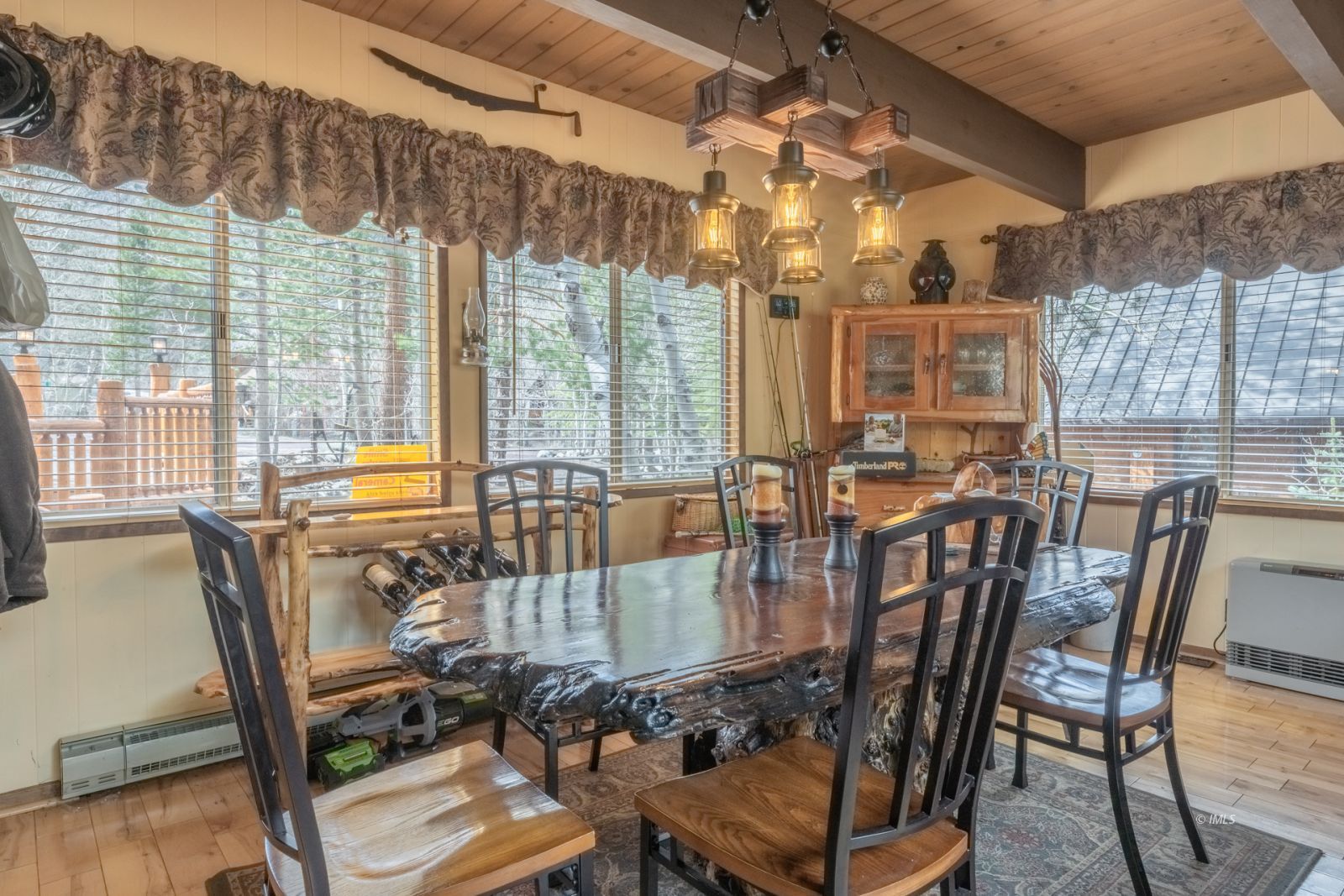 234 Brook Lane Bishop, CA 93514 - Photo 13 of 33 a view of a dining room with furniture window and outside view