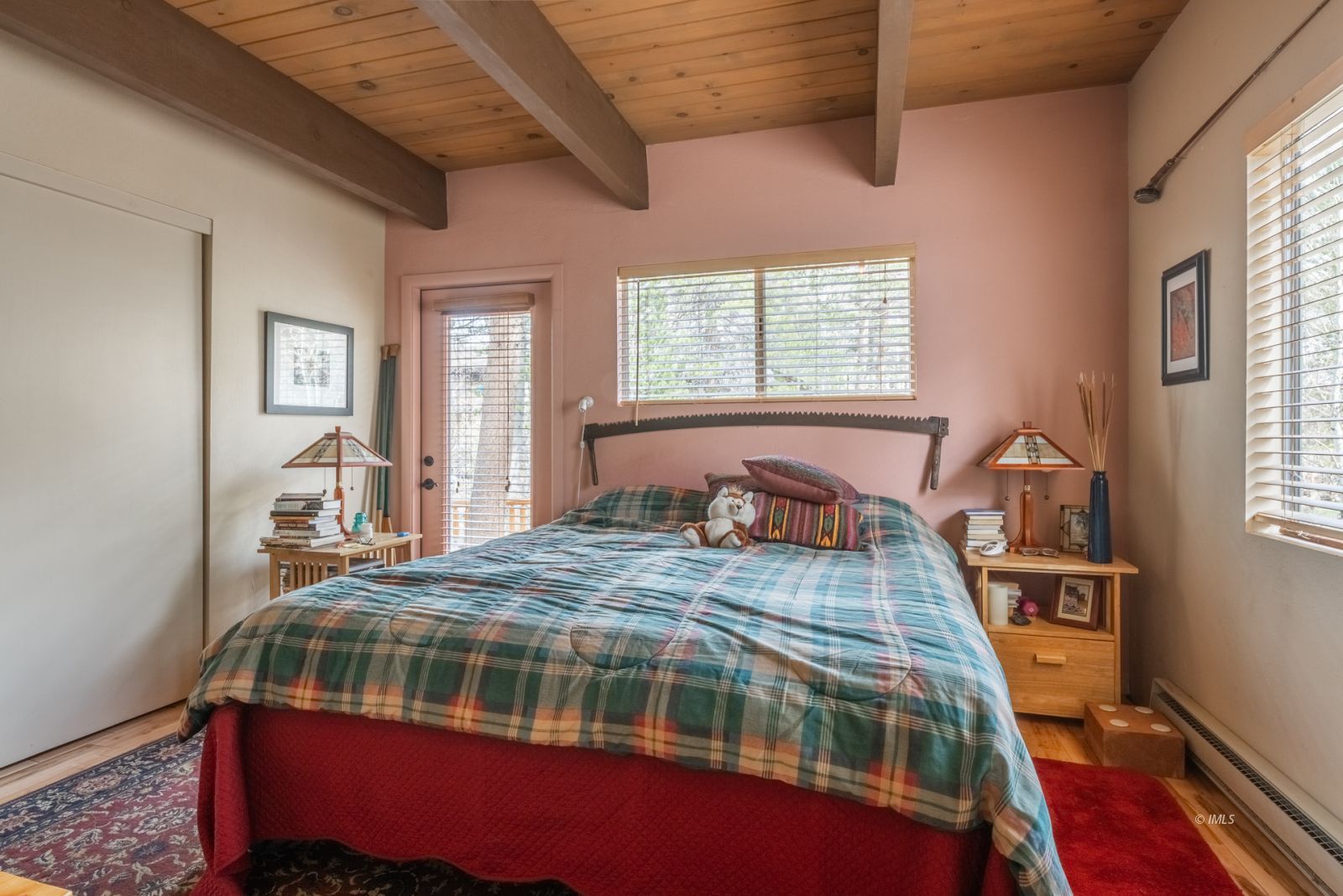 234 Brook Lane Bishop, CA 93514 - Photo 18 of 33 a bedroom with a bed and a dresser next to a window