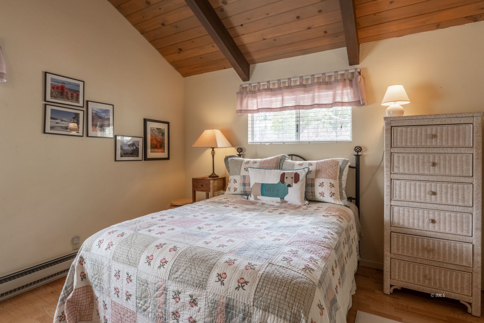 234 Brook Lane Bishop, CA 93514 - Photo 19 of 33 a bed sitting in a bedroom next to a window