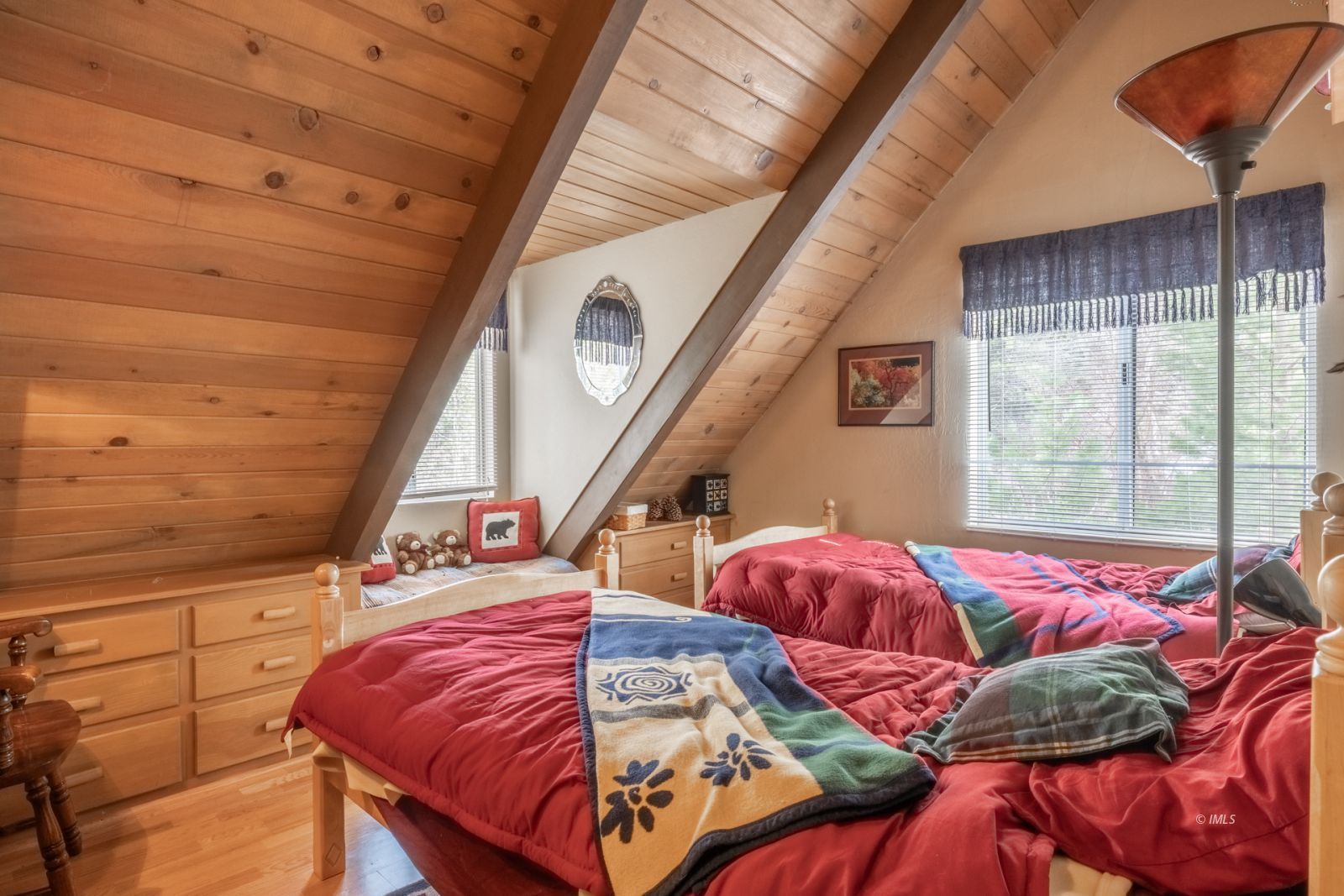 234 Brook Lane Bishop, CA 93514 - Photo 20 of 33 a bed sitting in a bedroom next to a window