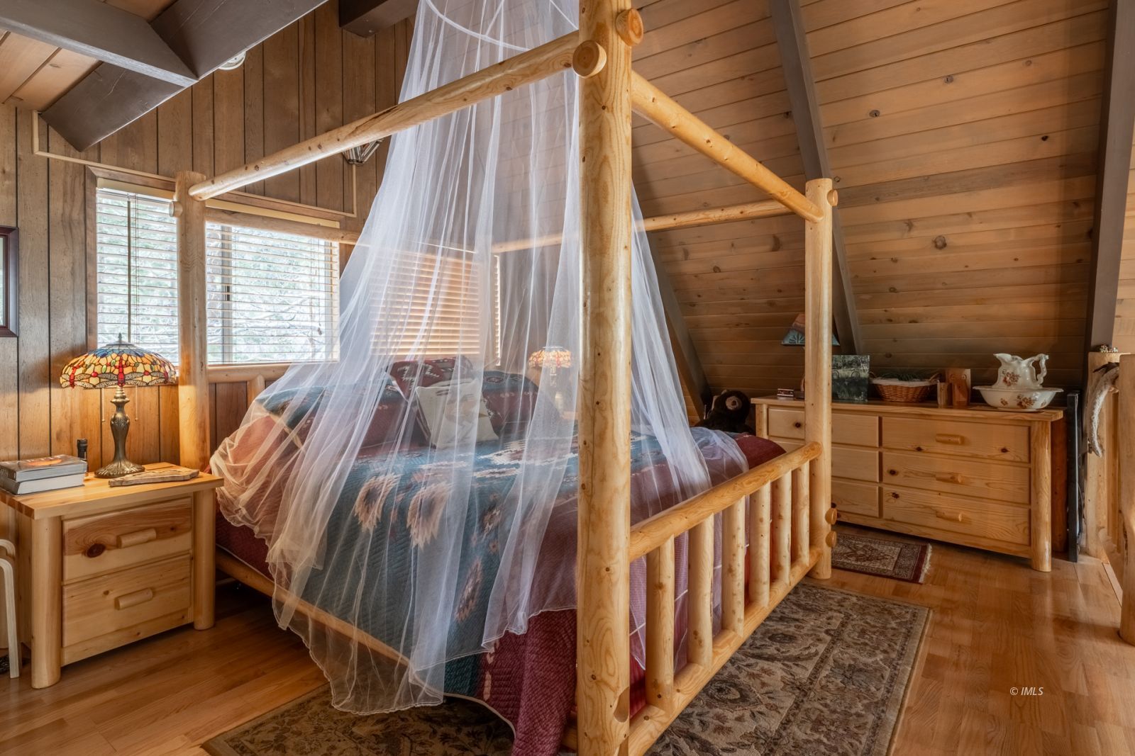 234 Brook Lane Bishop, CA 93514 - Photo 22 of 33 a view of a bedroom with furniture and windows